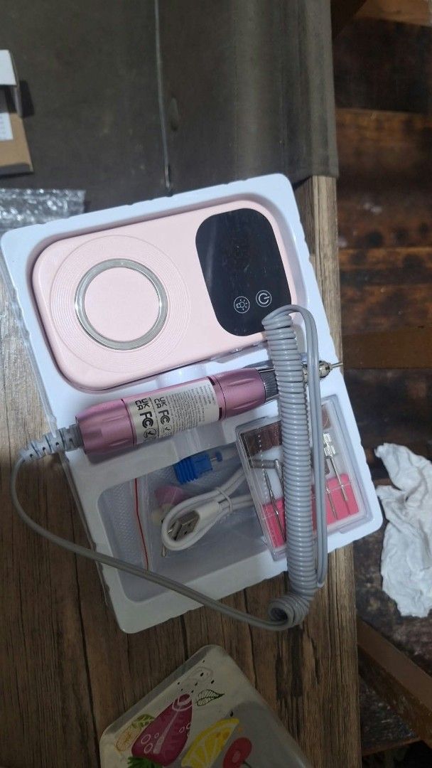 Electric Nail Polisher Drill Set with Bits (Category: Hands & Nails) located in Quezon City. Submitted by nobledeer.dc87f4 (Listing ID 1466623493, Image 2). Description: - Cute pastel electric nail polisher kit - Ideal for home manicures and pedicures - Includes main console unit, handpiece, and charging cable - Complete set of interchangeable drill bits and sanding bands included - Compact and lightweight design - Neatly organized in the origina