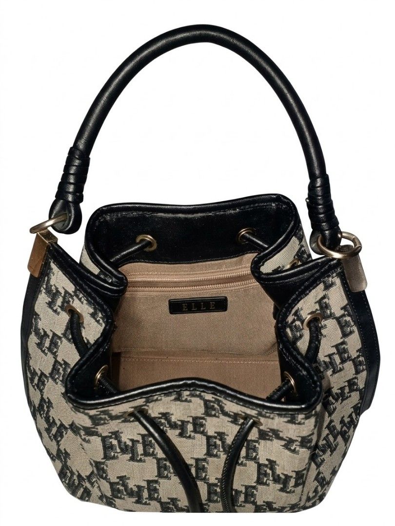 ELLE Monogram Drawstring Bucket Bag (Category: Luxury Bags & Wallets) located in Manila. Submitted by sengfigther06francis (Listing ID 1466618802, Image 1). Description: featuring an all-over monogram jacquard or woven pattern paired with black leather trim, a rigid top handle, and a drawstring closure. The interior is lined in a tan fabric, complete with a zippered pocket and a ELLE gold brand label..