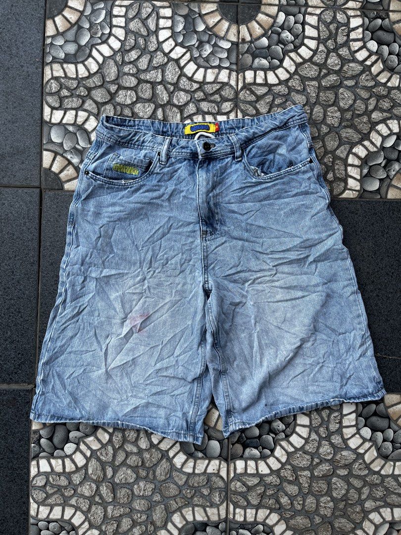 Empyre Light Wash Denim Shorts Size 32 (Category: Shorts) located in Calabanga. Submitted by jijithriftcamarinessur (Listing ID 1466608003, Image 1). Description: - Brand/Model: Empyre denim shorts - Wash: Light wash - Size: Tagged size 32 - Material: 100% cotton, Made in China - Features: Drawstring waist, yellow embroidered logo on coin pocket, patterned inner pocket lining - Flaw: Small red stain on the front left leg area.