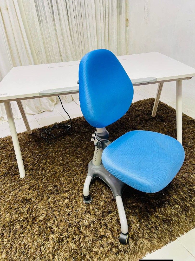 Ergonomic Chair (Category: Chairs) located in Meycauayan. Submitted by marygracecasimiro (Listing ID 1466638590, Image 3). Description: Ergoworks IMPACT Kids to Adult Ergonomic Chair, featuring vibrant blue upholstered seating and an adjustable grey spine structure with a built-in handle at the top Get this for only 4.5k🩷.