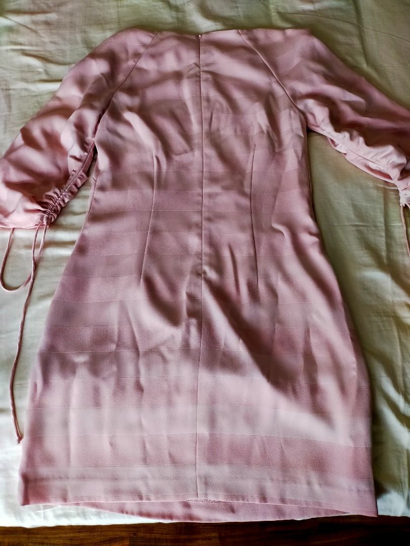 Ever New Pink Striped Dress (Category: Dresses) located in Caloocan City. Submitted by jgborgtrad47297 (Listing ID 1466599752, Image 3). Description: - Brand: Ever New - Color: Pink with horizontal stripe texture - Length: Midi - Neckline: Round neckline - Details: Back zipper and sleeves with ruched string-tie cuffs - Condition: Brand new with tags still attached.