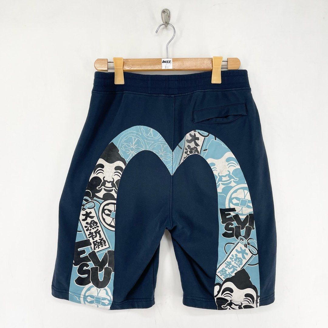 Evisu Daicock Sweat Shorts (Category: Shorts) located in Manila. Submitted by buzz.garments (Listing ID 1466667039, Image 1). Description: Size: XL on tag Dimensions(inches) -Waist/Width: 32”-40” (Strechable) -Hip: 21” -Front Rise: 15” -Thigh: 12” -Inseam: 9” -Outseam/Length : 24” -Leg Opening: 11” minor hairlines - color may vary due to lighting. please manage your expectations-minimal and unseen flaws must be considered..