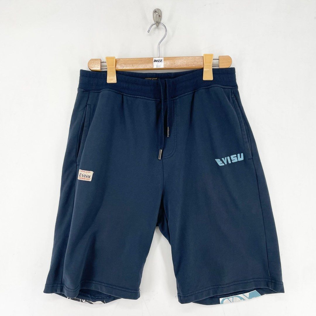Evisu Daicock Sweat Shorts (Category: Shorts) located in Manila. Submitted by buzz.garments (Listing ID 1466667039, Image 2). Description: Size: XL on tag Dimensions(inches) -Waist/Width: 32”-40” (Strechable) -Hip: 21” -Front Rise: 15” -Thigh: 12” -Inseam: 9” -Outseam/Length : 24” -Leg Opening: 11” minor hairlines - color may vary due to lighting. please manage your expectations-minimal and unseen flaws must be considered..