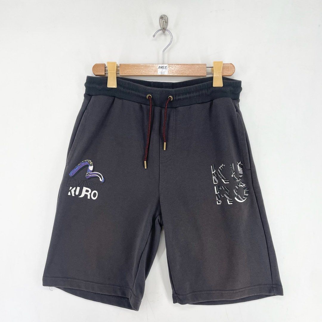 Evisu Kuro Dark Grey Sweat Shorts Authentic (Category: Shorts) located in Manila. Submitted by buzz.garments (Listing ID 1466672335, Image 1). Description: Size: XL on tag Dimensions(inches) -Waist/Width: 32”-42” (Strechable) -Hip: 21” -Front Rise: 14” -Thigh: 12” -Inseam: 9” -Outseam/Length : 21.5” -Leg Opening: 11” signs of usage - color may vary due to lighting. please manage your expectations-minimal and unseen flaws must be considered..