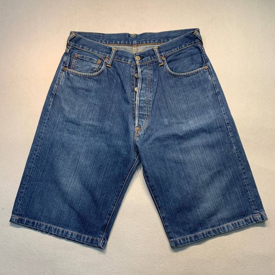 Evisu Lot 2001 Denim Shorts (Category: Shorts) located in Mandaluyong City. Submitted by theroom501 (Listing ID 1466681587, Image 2). Description: Evisu Lot 2001 Denim Shorts Style Code: Size on Tag: 32 Color: Blue Condition: Good pre-owned condition with a heavily distressed vintage look. Flaws/Issues: Crack prints Flat Lay Measurements: Pit to Pit: 32 inches Length: 24 inches Leegopening Length: 11 inches Price: 2500.