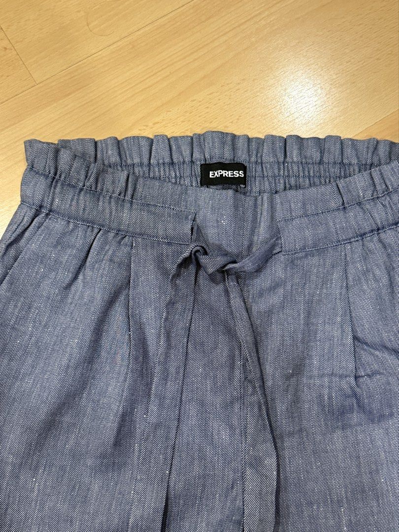 Express High-Waisted Shorts (Category: Shorts) located in Muntinlupa City. Submitted by alexisofia (Listing ID 1466726091, Image 3). Description: Stylish blue chambray shorts featuring a comfortable elastic paperbag waistband and a chic front tie-belt. Lightweight, breathable, and super easy to pair with tanks, tees, or blouses for a casual summer look! like new, worn few times / excellent condition size: Medium (M) Brand: Express.