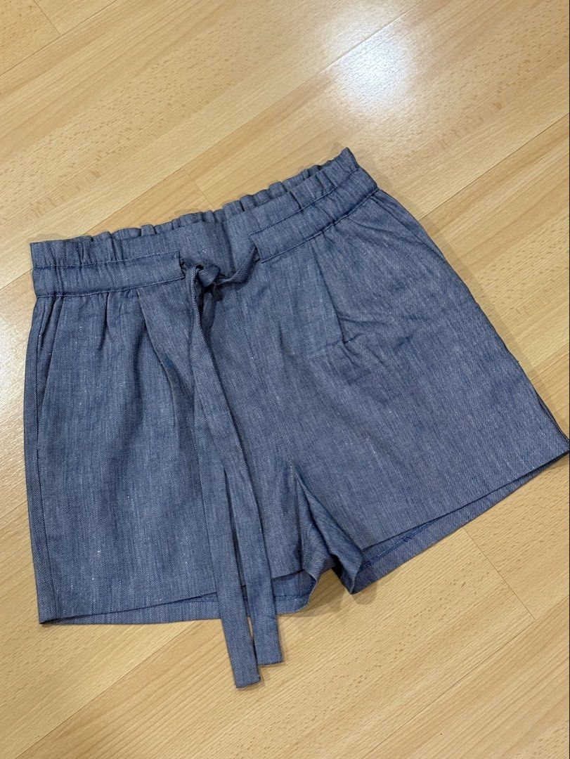 Express High-Waisted Shorts (Category: Shorts) located in Muntinlupa City. Submitted by alexisofia (Listing ID 1466726091, Image 1). Description: Stylish blue chambray shorts featuring a comfortable elastic paperbag waistband and a chic front tie-belt. Lightweight, breathable, and super easy to pair with tanks, tees, or blouses for a casual summer look! like new, worn few times / excellent condition size: Medium (M) Brand: Express.