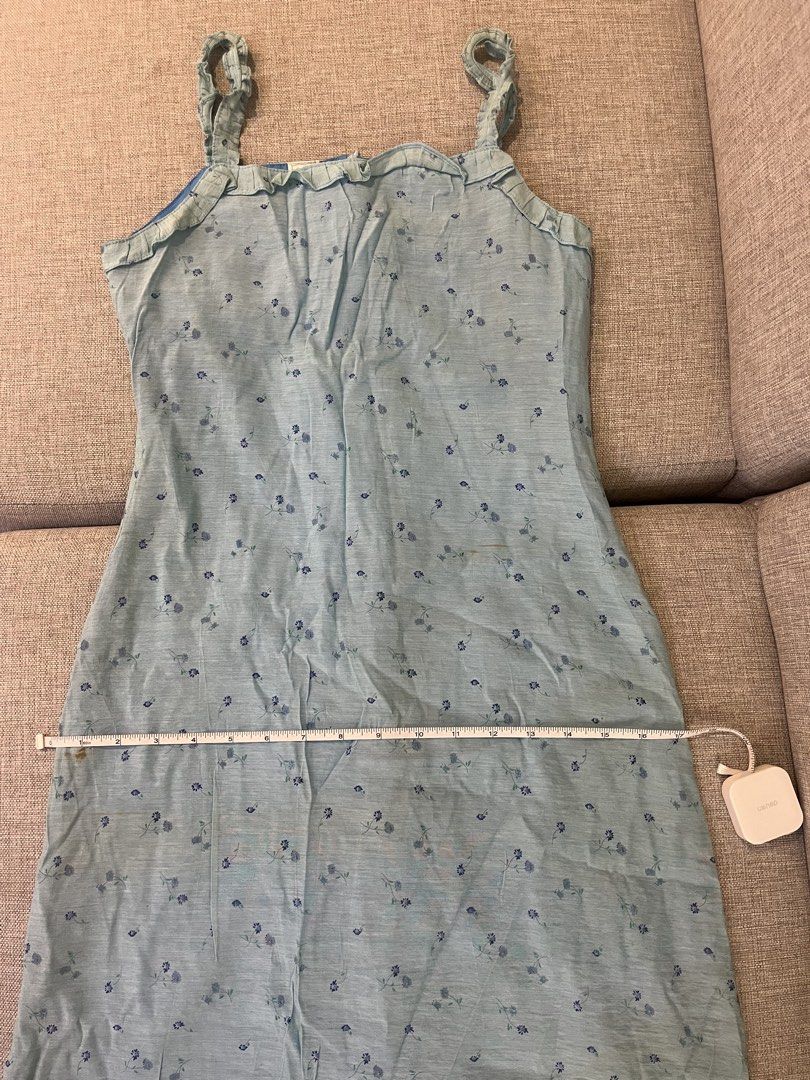 Face Light Blue Floral Dress (Category: Dresses) located in Manila. Submitted by _bellepepper (Listing ID 1466688988, Image 3). Description: - Brand/Size: Face, Size S - Design: Light blue dress with floral pattern, ruffle neckline, and gathered straps - With lining inside kaya makapal and hindi silag - Condition: Pre-loved with minor stains near the bottom hem and front RFS: Hindi na kasya sakin :(( This is too prettyyyy!!.