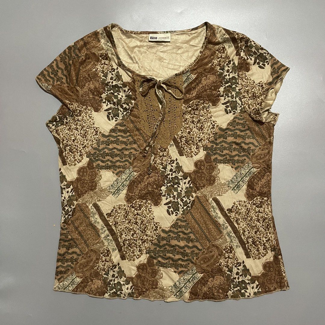 Faded Glory Vintage Brown Patchwork Print Top (Category: Shirts) located in Manila. Submitted by willowchie29 (Listing ID 1466602881, Image 1). Description: - Brand/Style: Vintage Faded Glory Y2K patchwork top - Colors: Shades of brown, beige, and green with mixed prints all over - Details: Scoop neckline with crochet lace inset and tie closure - Sleeves & Hem: Short cap sleeves and trendy wavy lettuce hem trim - Fabric: Lightweight and comfortab