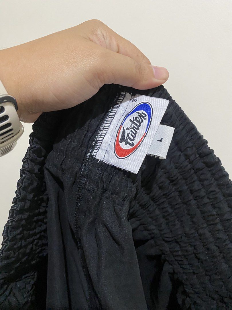 Fairtex Black Muay Thai Shorts (Category: Shorts) located in Pasig City. Submitted by k0pimonster (Listing ID 1466730312, Image 3). Description: See photos for dimensions. Unused.