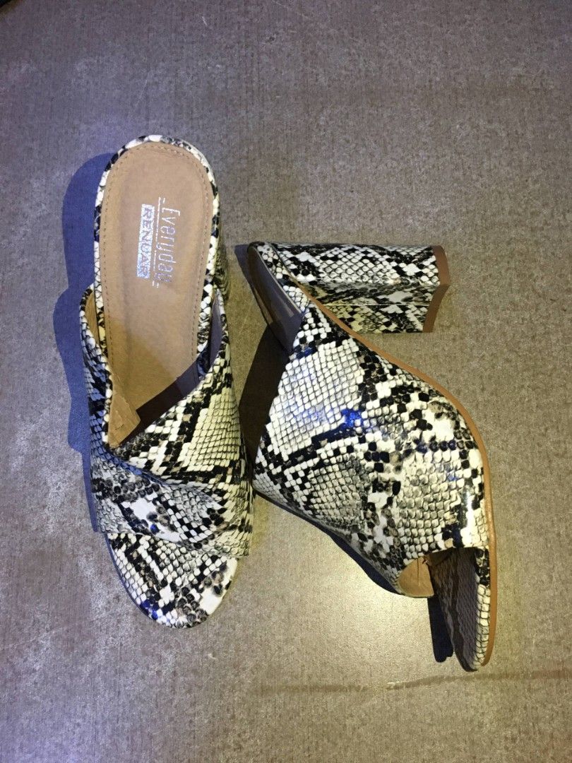 Faux Leather Snakeskin Mules Wedge Heels (Category: Sandals) located in Quezon City. Submitted by lizzyslittleletgos (Listing ID 1466571583, Image 1). Description: ☆ RENUAR ☆ size 36-37 ☆ 3 inches heels ☆ has minor flaws inside the mules but barely noticeable, still in good condition..