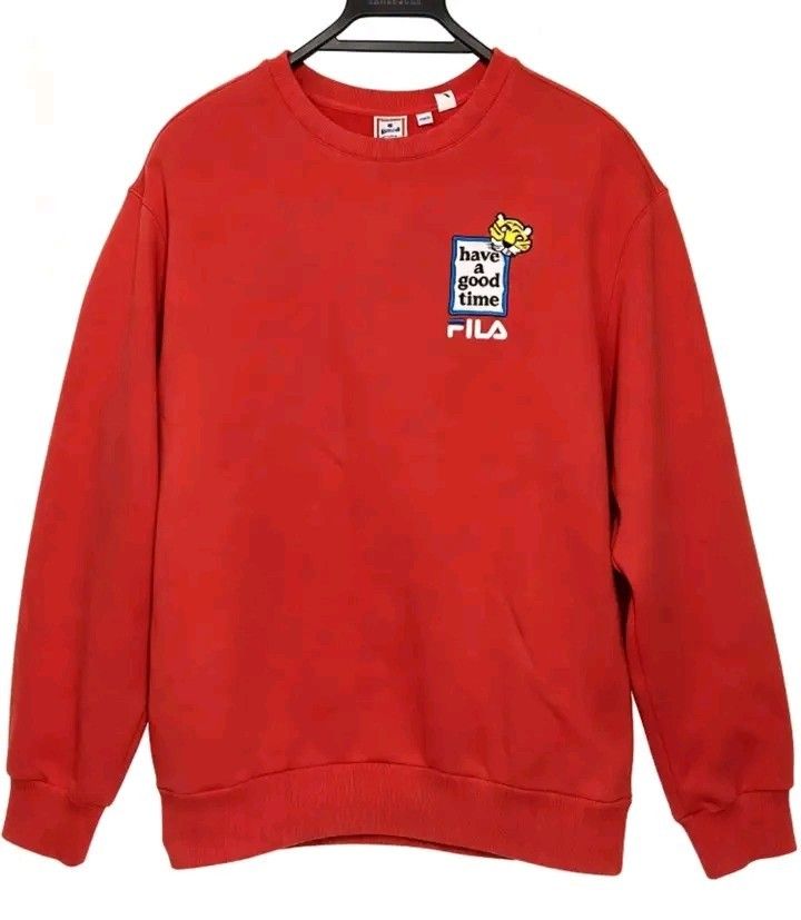 Fila x Have a Good Time Red Sweatshirt (Category: Coats, Jackets and Outerwear) located in Manila. Submitted by georgefinds25 (Listing ID 1466570570, Image 1). Description: - Brand: Fila x Have a Good Time - Color: Red - Design: Cute embroidered tiger graphic on the chest with dual branding logo text - Features: Long sleeves, ribbed cuffs and hem, comfortable fleece lining - Condition: Excellent, clean piece with zero flaws.