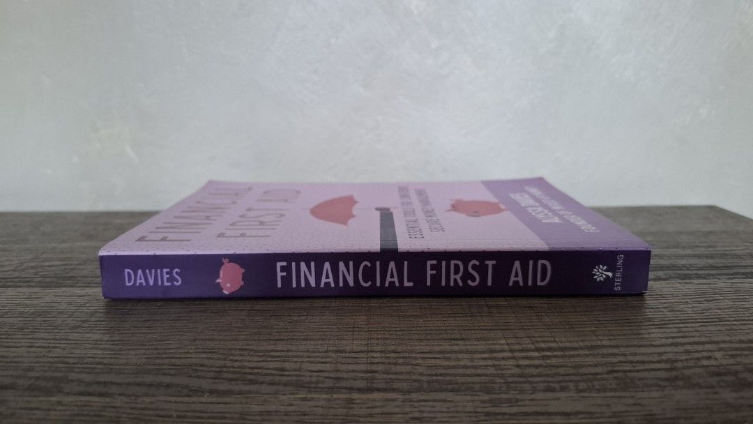 Financial First Aid by Alyssa Davies (Category: Storybooks) located in Quezon City. Submitted by arkiv.ph (Listing ID 1466627836, Image 1). Description: I am selling a copy of Financial First Aid: Essential Tools for Confident, Secure Money Management by Alyssa Davies, Founder of Mixed Up Money, published by Sterling, Paperback. Condition Details: • Pre-loved, well taken care of • Clean pages inside • Binding intact • No foxing, no smell, no dama