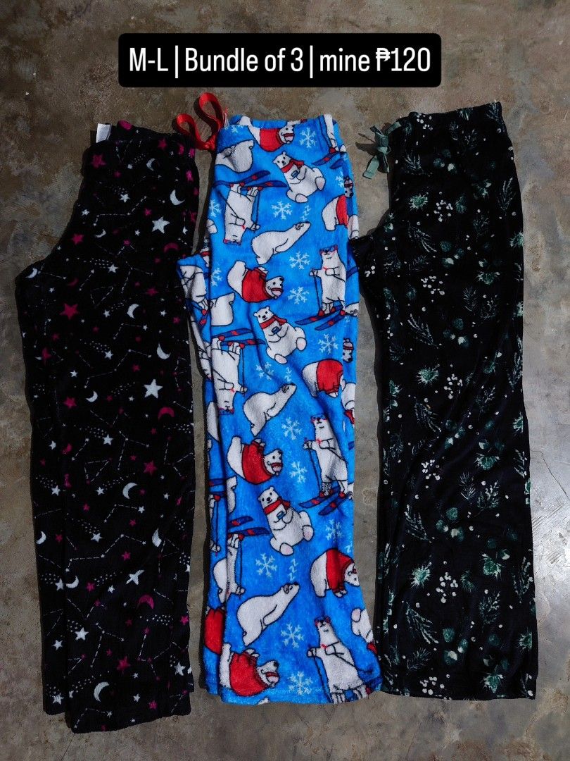 Fleece Pajama Pants Bundle of 3 Size M-L (Category: Undergarments & Loungewear) located in Diffun. Submitted by declutteredbyJill (Listing ID 1466674340, Image 1). Description: - Item: Bundle of 3 fleece pajama pants - Size: M-L - Designs: 1x Black with moon and star prints, 1x Blue with skiing polar bears, 1x Black with green foliage patterns - Material: Soft and warm fleece - Condition: Great for sleeping or cozy lounging - Note: Selling all th