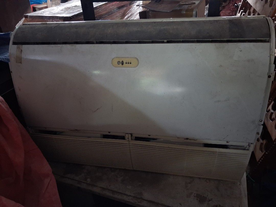 Floor Standing Air Conditioner Unit (Category: Air Conditioning and Heating) located in Quezon City. Submitted by ssvcn (Listing ID 1466603765, Image 1). Description: - Type: Large white floor-standing air conditioning unit - Features: Front intake louvers, top vent, and center-front control panel - Condition: Good working order with minor dust and scuffs from storage - Logistics: Heavy unit, strict pickup only - Important: Please bring adequate 