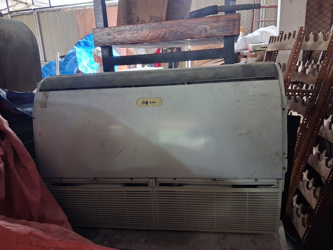 Floor Standing Air Conditioner Unit (Category: Air Conditioning and Heating) located in Quezon City. Submitted by ssvcn (Listing ID 1466603765, Image 3). Description: - Type: Large white floor-standing air conditioning unit - Features: Front intake louvers, top vent, and center-front control panel - Condition: Good working order with minor dust and scuffs from storage - Logistics: Heavy unit, strict pickup only - Important: Please bring adequate 