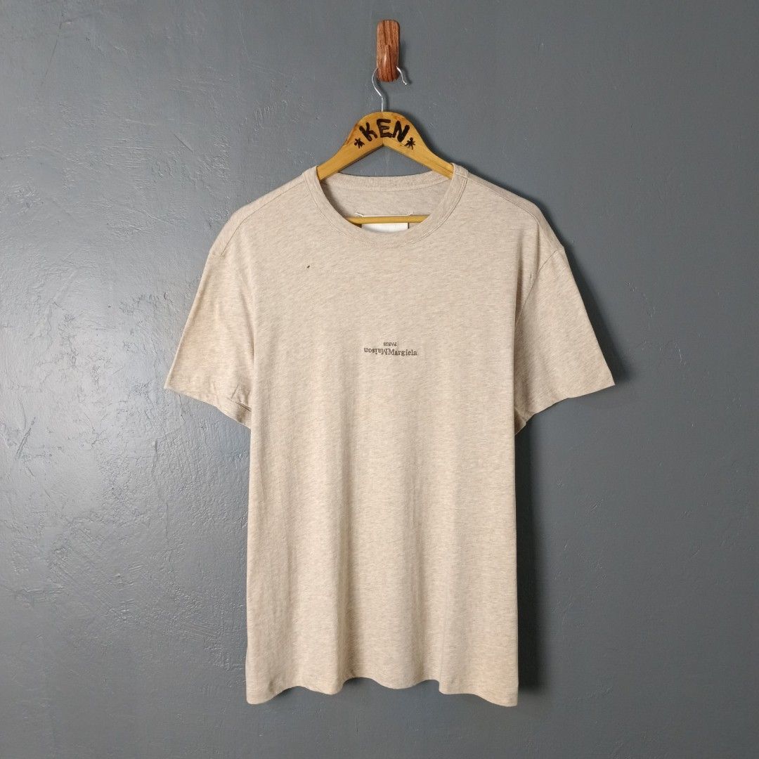 For Men - Maison Margiela - Mid Logo (Category: Tshirts & Polo Shirts ) located in Bacolod City. Submitted by drop.ph (Listing ID 1466727667, Image 2). Description: Maison Margiela - Mid Embroidered Authentic *Oversized, Blank Label *Size M - 23x27.5 *Excellent cloth *2 small holes *Price: 880php *Add SF if outside Bacolod City.