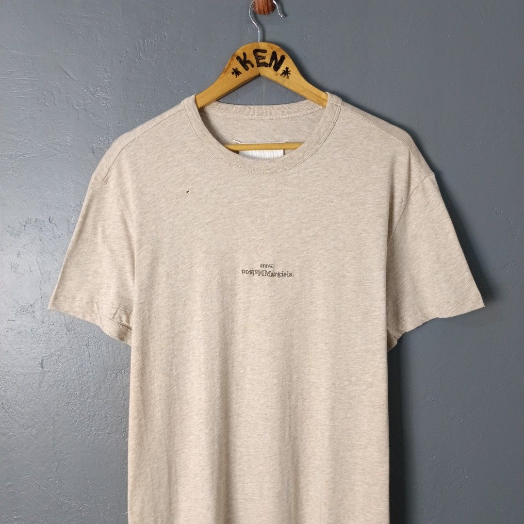 For Men - Maison Margiela - Mid Logo (Category: Tshirts & Polo Shirts ) located in Bacolod City. Submitted by drop.ph (Listing ID 1466727667, Image 3). Description: Maison Margiela - Mid Embroidered Authentic *Oversized, Blank Label *Size M - 23x27.5 *Excellent cloth *2 small holes *Price: 880php *Add SF if outside Bacolod City.