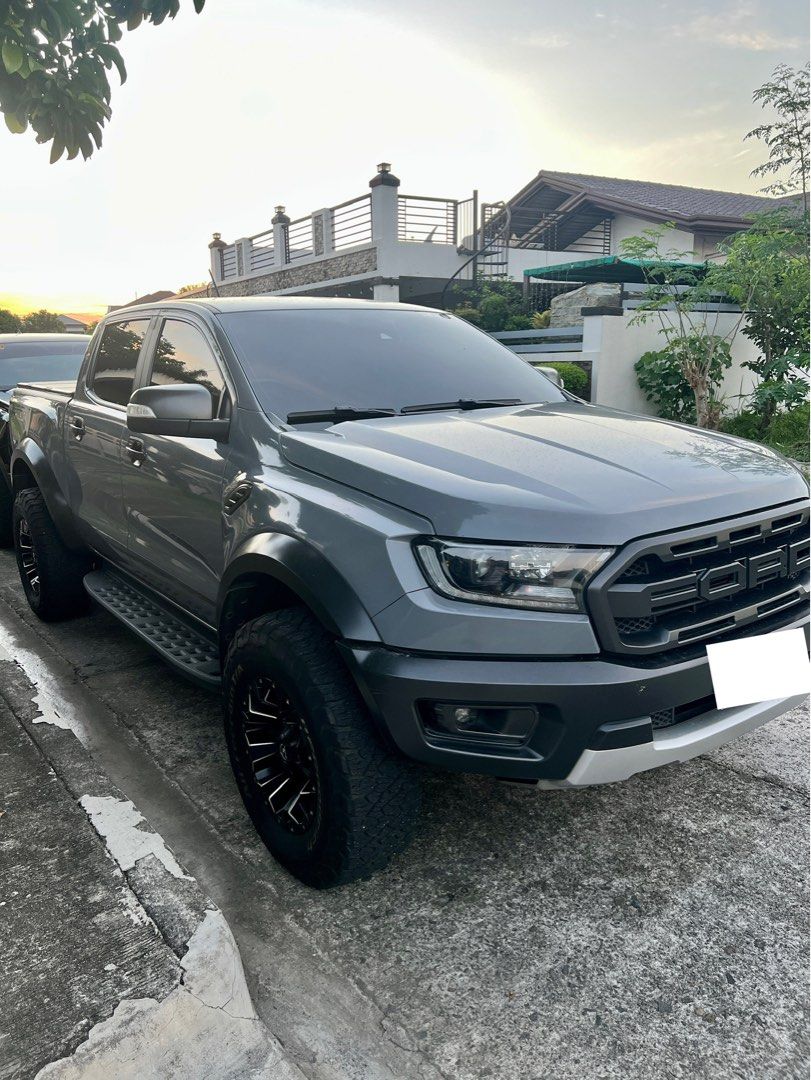 Ford Ranger (Category: Used Cars) located in Caloocan City. Submitted by rnl0702 (Listing ID 1466673004, Image 2). Description: Ford Raptor 4x4 A/T 2021 model Aeroklas Bed Cover worth 60k 17’ Fuel Mags wrapped around with 4 new BFG KO3 Tires worth 150k from Autobot 2 original Keys Complete Documents Newly PMS Registered till next year Open for Cash/Financing Biñan Laguna.