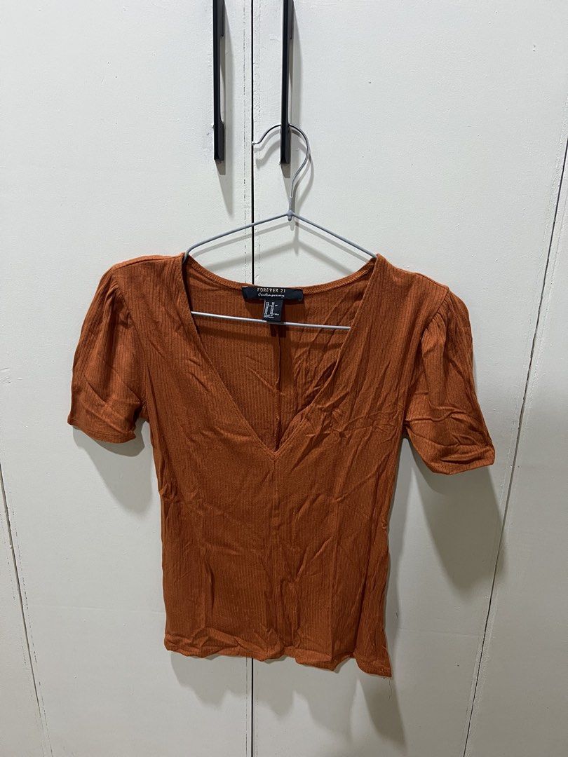 Forever 21 Contemporary Brown Ribbed V-Neck Top (Category: Sleeveless) located in Makati City. Submitted by dcal29 (Listing ID 1466697202, Image 1). Description: .