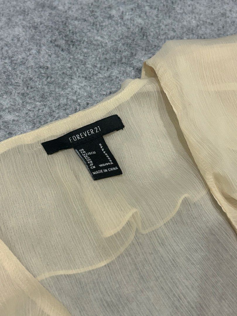 Forever 21 Whimsy Flowy Sheer Blouse (Category: Blouses) located in Balanga. Submitted by shenanigansph (Listing ID 1466568958, Image 3). Description: size: small to medium condition: 10/10 flaws: n/a rfs: decluttering 𝘊𝘖𝘓𝘖𝘙 𝘔𝘈𝘠 𝘝𝘈𝘙𝘠 𝘚𝘓𝘐𝘎𝘏𝘛𝘓𝘠 𝘋𝘜𝘌 𝘛𝘖 𝘓𝘐𝘎𝘏𝘛𝘐𝘕𝘎 🪩.