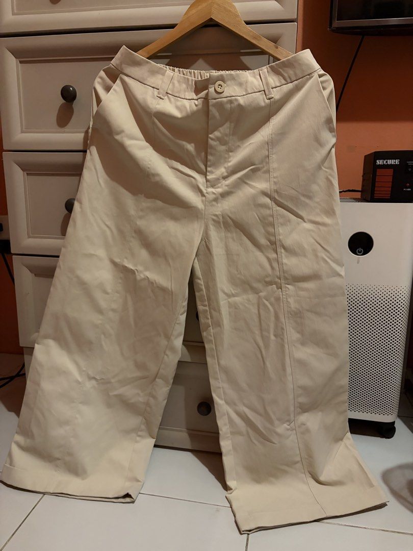 Forme Beige Medium Wide Leg Pants (Category: Jeans) located in Quezon City. Submitted by mmiyah27 (Listing ID 1466688278, Image 1). Description: - Brand: Forme - Size: 29-31 waistline (stretchable) - Color: Neutral beige (goes with any top) - Fit: Comfortable wide-leg style for daily wear - Waistband: Elastic at the back for extra comfort - Closure: Button closure with zip fly - Details: Pleated front seams and functional side pockets.