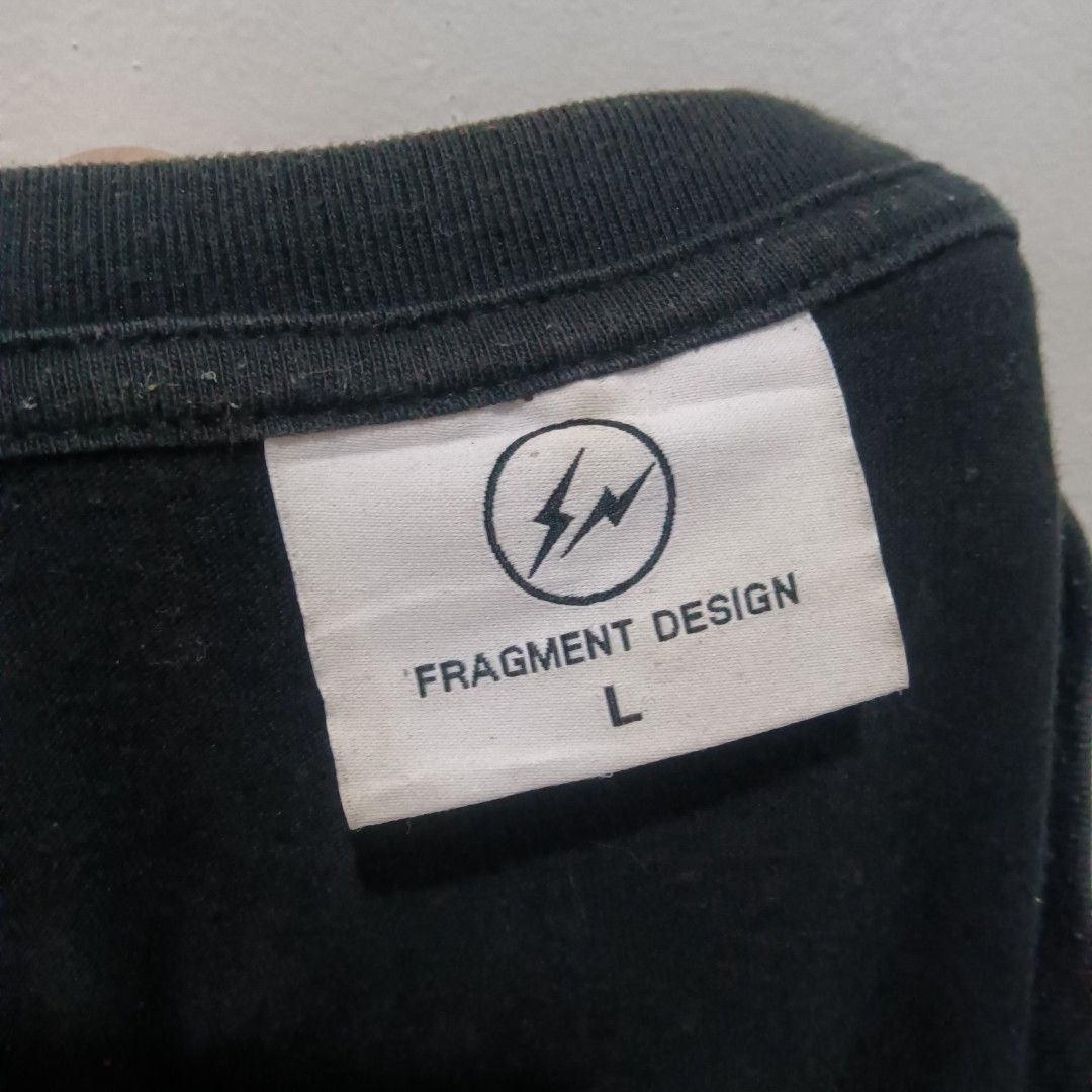 FRAGMENT DESIGN Graphic Shirt (Category: Tshirts & Polo Shirts ) located in Caloocan City. Submitted by jaychingsss (Listing ID 1466627744, Image 3). Description: Fragment Design Shirt - 100 22x29 Complete Tags Color Rate: 9/10 No issue NEED WASH.