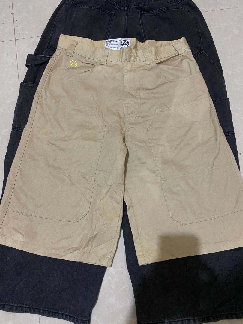 Freshjive Khaki Cargo Shorts Size 34 (Category: Shorts) located in Manila. Submitted by lilsintenel (Listing ID 1466577255, Image 1). Description: - Brand: Freshjive - Style: Khaki cargo shorts with straight leg fit and knee length - Size: 34 (interior brand label intact) - Material: 70% cotton and 30% nylon blend for durability and comfort - Features: Multiple utility pockets, yellow embroidered branding near the front pocket, and back pocket de