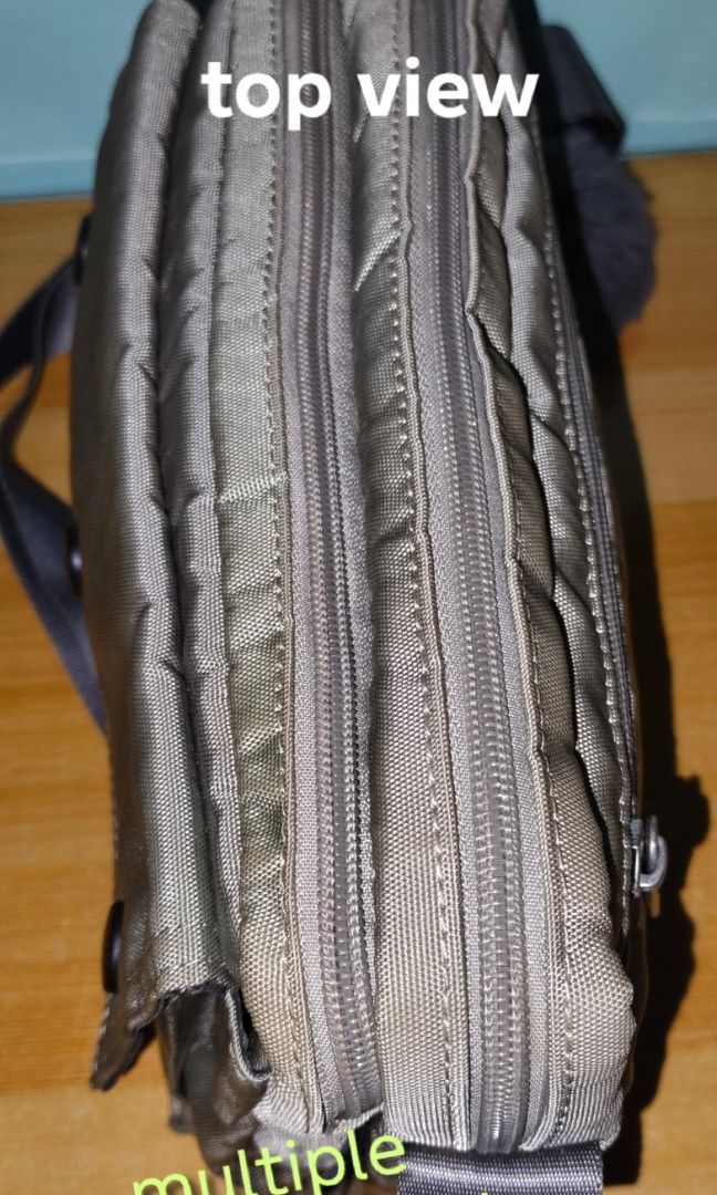 FX CREATIONS CROSS BODY BAG (Category: Cross-body Bags) located in Rizal. Submitted by baltiq (Listing ID 1466647000, Image 3). Description: FX Creations Brand ✔thick nylon canvass material ✔wide adjustable, durable strap ✔zip closures compartments; multiple pockets; nylon lining 📌no rips or tears, good stitching 📌very durable, bought in Japan 2+yrs ago matagal nang hindi nagamit, nakatabi nlang 📌clean inside. Needs cleaning outside may kadumi