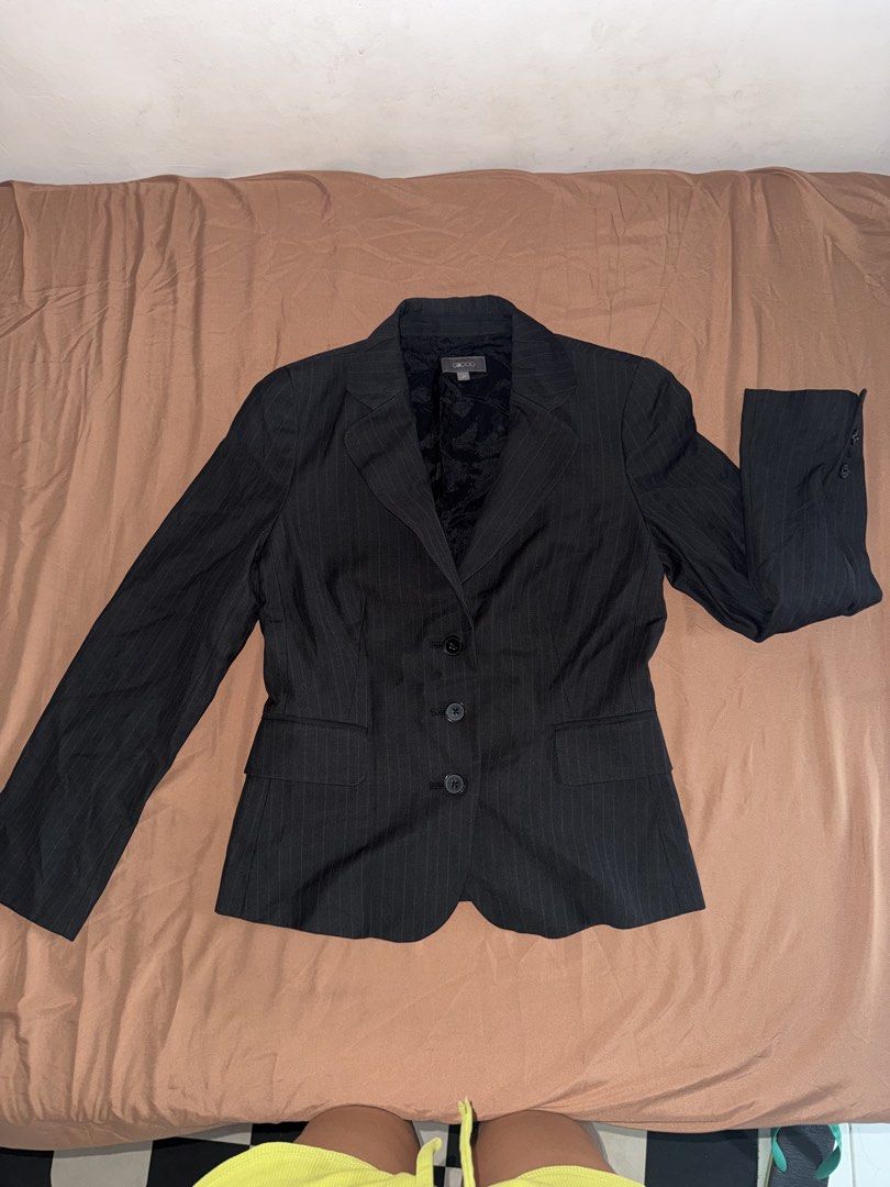 Black Pinstripe Suit Blazer Jacket (Category: Coats, Jackets and Outerwear) located in Pasay City. Submitted by cheyennesayson (Listing ID 1466572578, Image 1). Description: - Brand: G2000 - Color/Pattern: Black with pinstripes - Fit: Tailored through the waist - Closure: Three-button front - Pockets: Flap pockets at the hips - Sleeves: Long with three buttons on each cuff - Perfect for business casual attire.