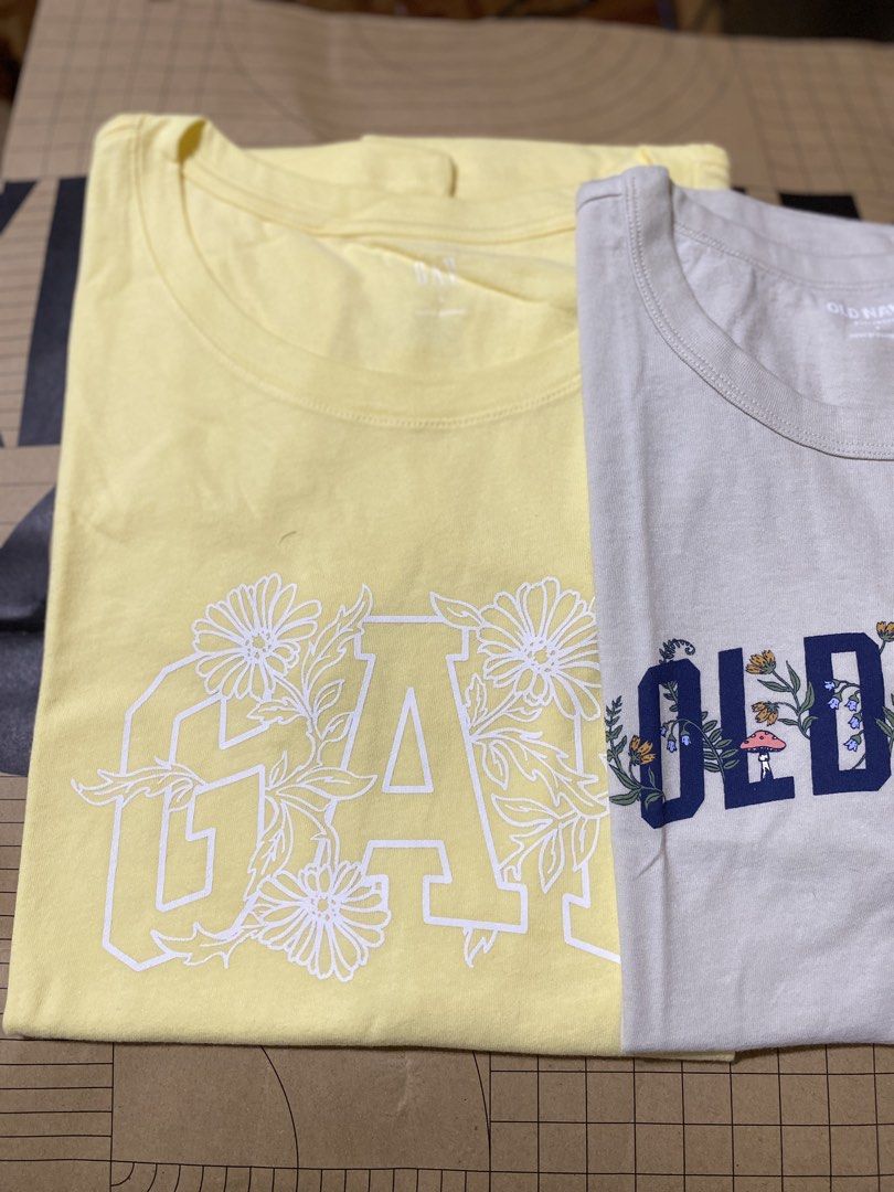 Gap and Old Navy Floral Graphic T-Shirts Bundle (Category: Shirts) located in Batangas. Submitted by lux_kimmy (Listing ID 1466735538, Image 3). Description: - Set of 2 cute graphic tees (Yellow Gap tee & Cream Old Navy tee) - Features floral, daisy, and adorable tiny mushroom designs - Classic crew neck and short sleeve fit - Super comfortable for daily casual wear Available sizes: XS Small Med Large XL 2XL Bundle Price: ₱799 Authentic from US.
