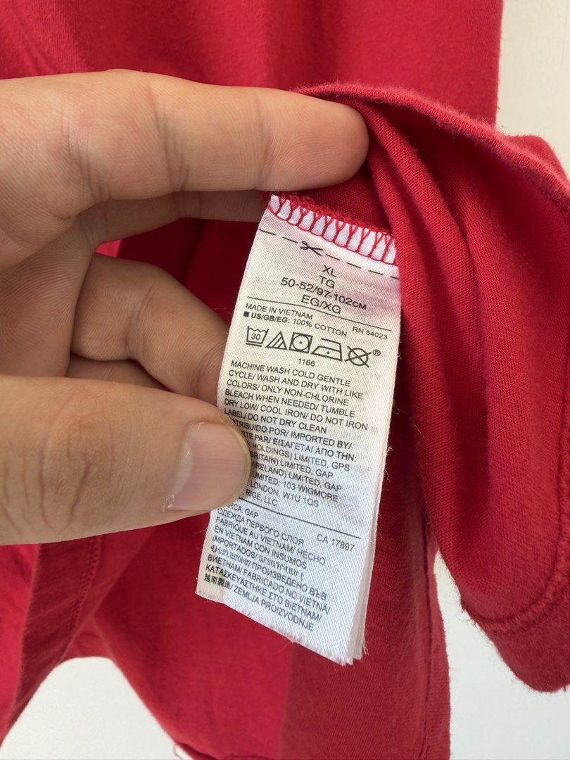 GAP Everyday Red T-Shirt XL (Category: Shirts) located in Quezon City. Submitted by satisfied_buyer (Listing ID 1466581755, Image 3). Description: - Brand: Gap - Item: Everyday Red T-Shirt - Size: XL - Material: 100% cotton - Origin: Made in Vietnam - Design: Classic crew neck, short sleeves - Condition: Clean overall, with a minor faint mark near the right shoulder blade on the back Shoulders 47m Chest 50m Length 72m .