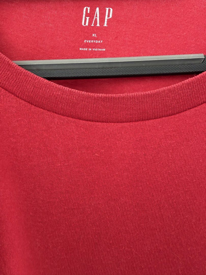 GAP Everyday Red T-Shirt XL (Category: Shirts) located in Quezon City. Submitted by satisfied_buyer (Listing ID 1466581755, Image 2). Description: - Brand: Gap - Item: Everyday Red T-Shirt - Size: XL - Material: 100% cotton - Origin: Made in Vietnam - Design: Classic crew neck, short sleeves - Condition: Clean overall, with a minor faint mark near the right shoulder blade on the back Shoulders 47m Chest 50m Length 72m .