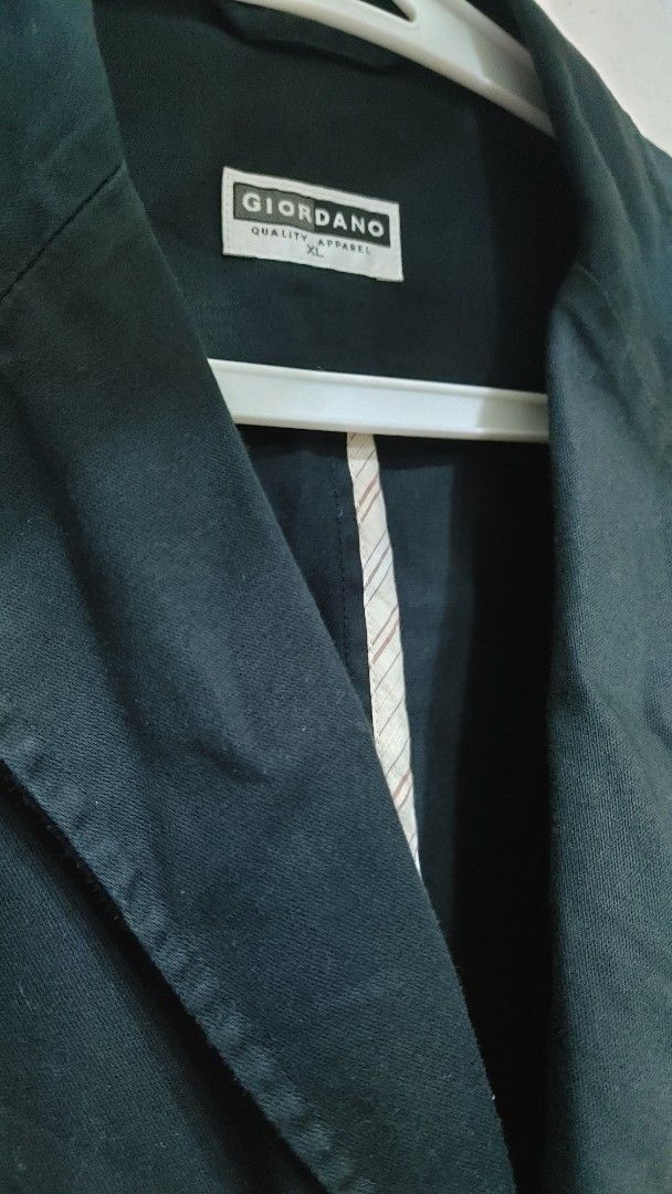 Giordano Black Casual Blazer Jacket XL (Category: Coats, Jackets and Outerwear) located in Quezon City. Submitted by chph3rd (Listing ID 1466773272, Image 3). Description: - Brand: Giordano - Color: Black (solid, easy to match) - Size: XL - Closure: Three-button front - Pockets: Three patch pockets (one chest, two hem) - Details: Striped accent tape along the inner collar seam - Condition: Clean and ready to wear.