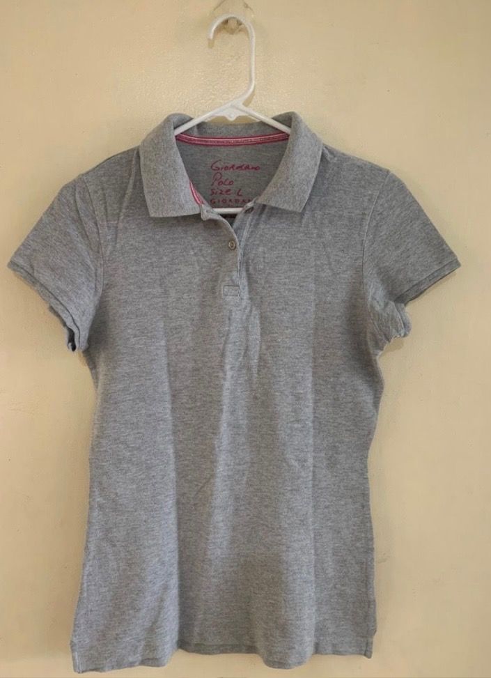 Giordano Poloshirt Womens (Category: Blouses) located in Valenzuela. Submitted by clickandshoppreloved (Listing ID 1466622829, Image 1). Description: Giordano Poloshirt Womens Onhand, Original Large Ontag, (24L x 15.5W) Color : Grey (Excellent Condition, Good As New).