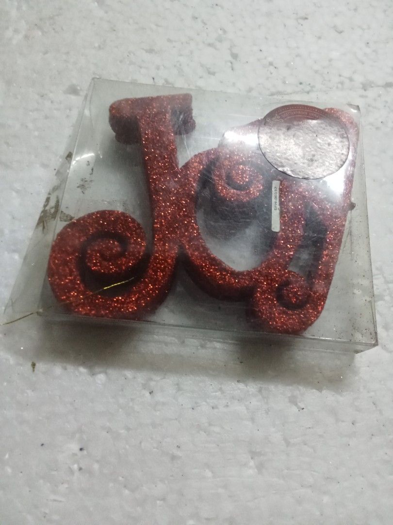 Glittered Red Ornaments (Category: Other Home Decor) located in Rizal. Submitted by ellengreen18 (Listing ID 1466669844, Image 2). Description: One set available "JOY" red color (3 pcs./pack) MOP: Gcash only Sf for buyer's account Deliver thru Lalamove,Grab or JNT.