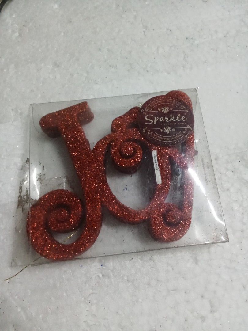 Glittered Red Ornaments (Category: Other Home Decor) located in Rizal. Submitted by ellengreen18 (Listing ID 1466669844, Image 1). Description: One set available "JOY" red color (3 pcs./pack) MOP: Gcash only Sf for buyer's account Deliver thru Lalamove,Grab or JNT.