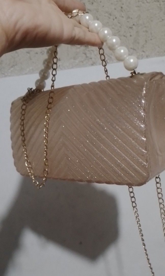 Glittery Jelly Sling Bag (Category: Purses & Pouches) located in Batangas. Submitted by zenrez_shop (Listing ID 1466693635, Image 2). Description: Kasya phone and eyeglasses sa loob may compartment sya..