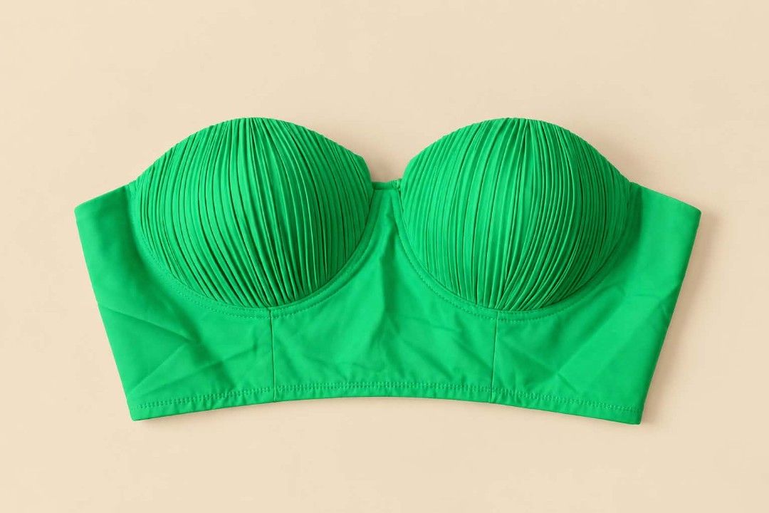 Green Pleated Bandeau Bikini Top (Category: Bikinis & Swimsuits) located in Manila. Submitted by joshbelgic17602 (Listing ID 1466613301, Image 1). Description: - Style: Strapless bandeau bikini top in a vibrant bright green - Design: Structured cups with stylish vertical pleating and a clean straight hem - Fit & Support: Stretchy fabric offering great support with an easy slip-on design - Condition: Brand new, never worn (tags removed).