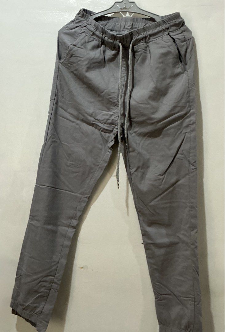 Grey Jogger Pants Drawstring (Category: Other Bottoms) located in San Pedro. Submitted by itsannag (Listing ID 1466614099, Image 1). Description: - Color: Grey - Fit: Relaxed fit with tapered legs - Material: Soft and comfortable - Best for: Daily lounging, casual wear, or running errands Good fit for XS to S.
