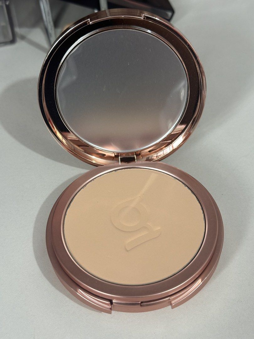 GRWM Cosmetics Pressed Powder Compact Rose Gold (Category: Makeup) located in Manila. Submitted by rhirhi.21 (Listing ID 1466617152, Image 2). Description: - Brand: GRWM Cosmetics - Shade: Linen - Packaging: Sleek white lid with brown branding and rose gold base - Features: Built-in mirror under the lid and embossed logo on powder - Size: Travel-friendly, perfect for your handbag or makeup pouch.