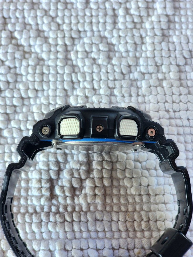 GShock (Category: Men's Watches) located in Imus. Submitted by alecsssss (Listing ID 1466569757, Image 3). Description: - Model: Casio G-Shock GA-120TR (Module 5229) - Color: Black resin with blue, white, and red accents - Display: Analog-Digital with textured side buttons and stainless steel case back - Durability: Shock resistant, anti-magnetic structure, and 20 bar (200m) water resistance - Functions: World time and reliable daily wear perform