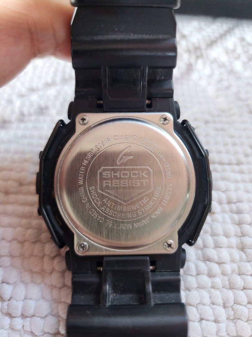 GShock (Category: Men's Watches) located in Imus. Submitted by alecsssss (Listing ID 1466570379, Image 3). Description: - Model: Casio G-Shock GA-120BB (Module 5229) - Color/Material: Black resin strap, bezel, and stainless steel case back - Protection: Built-in bullbar wire guard protector - Display: Analog-digital with dark dial and white hands - Water Resistance: Up to 20 bar - Condition: Lightly Used - Bought in Japan - No Box - Personal Coll