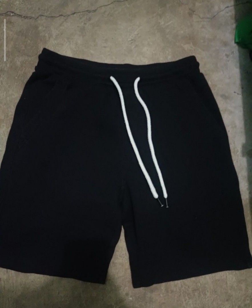 GU Black Sweatshorts Size M (Category: Shorts) located in Quezon City. Submitted by kramps.23 (Listing ID 1466736184, Image 1). Description: - Brand: GU - Color: Black - Size: M (fits 170/80A) - Material: 80% cotton, 20% polyester (Made in Indonesia) - Features: Adjustable drawstring waist with thick white cords, 2 front pockets - Condition: Good basic shorts ideal for lounging or casual outings Dimes: - Waist: 29-33 - Lenght: 19 - LO: 12.