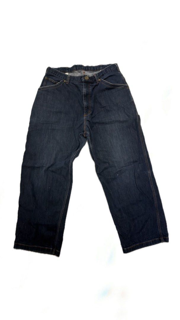 GU Dark Blue Denim Painter Jeans XL (Category: Jeans) located in Manila. Submitted by lebyo (Listing ID 1466705537, Image 1). Description: - Brand: GU - Size: XL - Color: Dark blue / Deep indigo wash with contrast stitching - Style: Classic painter / carpenter jeans - Features: Multiple utility pockets, hammer loop, and back cinch buckle - Material: 99% cotton, 1% spandex for a comfortable stretch.