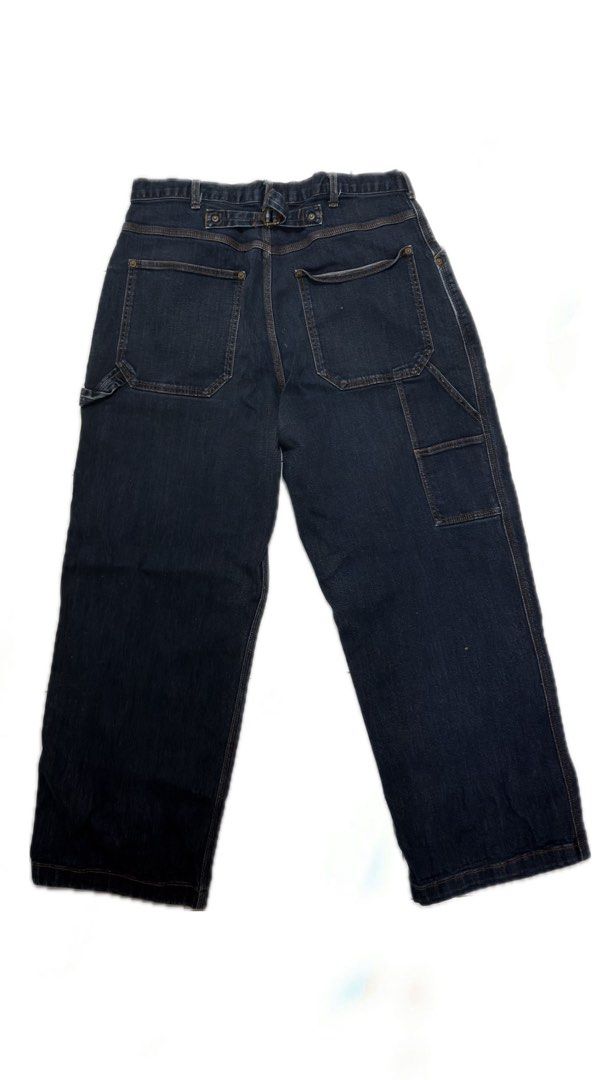 GU Dark Blue Denim Painter Jeans XL (Category: Jeans) located in Manila. Submitted by lebyo (Listing ID 1466705537, Image 2). Description: - Brand: GU - Size: XL - Color: Dark blue / Deep indigo wash with contrast stitching - Style: Classic painter / carpenter jeans - Features: Multiple utility pockets, hammer loop, and back cinch buckle - Material: 99% cotton, 1% spandex for a comfortable stretch.