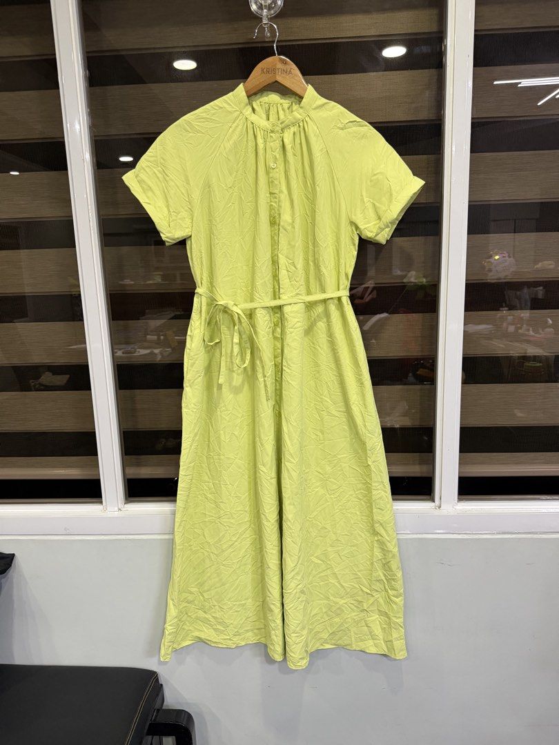 GU Lime Green Button-Up Midi Dress Size S (Category: Dresses) located in Manila. Submitted by kristinata44809 (Listing ID 1466582997, Image 2). Description: - Brand/Model: GU midi dress - Size: Small - Color: Vibrant lime green - Material: 100% polyester - Features: Short sleeves, high neckline, front button closure, and matching tie belt - Bonus: Practical side pockets - Styling: Great for casual days out, errands, or pairing with sandals and sn