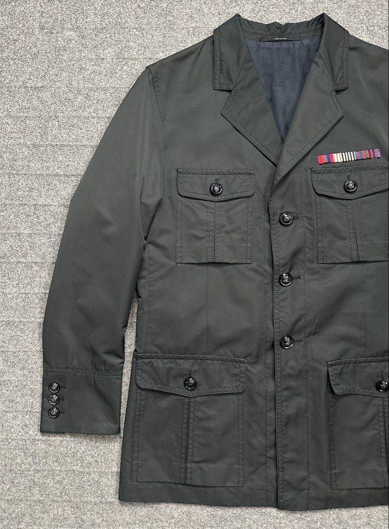Gucci - Frida Giannini A/W08 Multi-Pocket Field Jacket - Black. (Category: Coats, Jackets and Outerwear) located in Manila. Submitted by scissor.2fifthy (Listing ID 1466653446, Image 3). Description: Gucci - Frida Giannini A/W08 Multi-Pocket Field Jacket - Black. Tagged size: 50 (see measurement) Made in Italy Material: 57% Polyester - 43% Cotton Buttons: Gucci 85/100 condition rate Used with care Flaw: Minor sign of usage and minor tarnish in bu