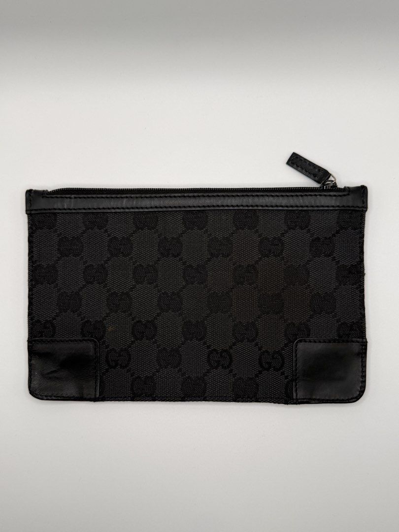 Gucci Black GG Monogram Canvas Zipper Pouch (Category: Luxury Bags & Wallets) located in Quezon City. Submitted by crsq_shop (Listing ID 1466772041, Image 1). Description: ✨ PRELOVED GUCCI GG CANVAS FLAT POUCH ✨ A classic designer piece featuring Gucci’s iconic GG Canvas. 🤎 • Gucci GG Canvas Flat Pouch • Preloved 💰 ₱9,500 📩 DM for inquiries. Disclaimer: CRSQ_Shop is not associated nor affiliated with any of the brands posted. #CRSQLuxury #Prel