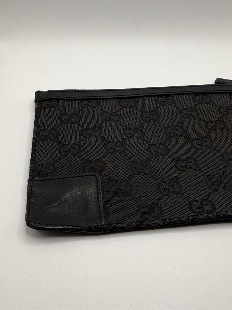 Gucci Black GG Monogram Canvas Zipper Pouch (Category: Luxury Bags & Wallets) located in Quezon City. Submitted by crsq_shop (Listing ID 1466772041, Image 3). Description: ✨ PRELOVED GUCCI GG CANVAS FLAT POUCH ✨ A classic designer piece featuring Gucci’s iconic GG Canvas. 🤎 • Gucci GG Canvas Flat Pouch • Preloved 💰 ₱9,500 📩 DM for inquiries. Disclaimer: CRSQ_Shop is not associated nor affiliated with any of the brands posted. #CRSQLuxury #Prel